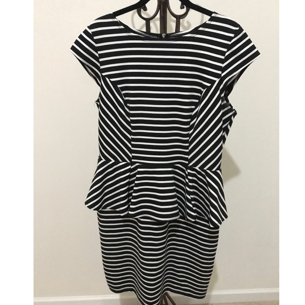 Black and white striped peplum dress